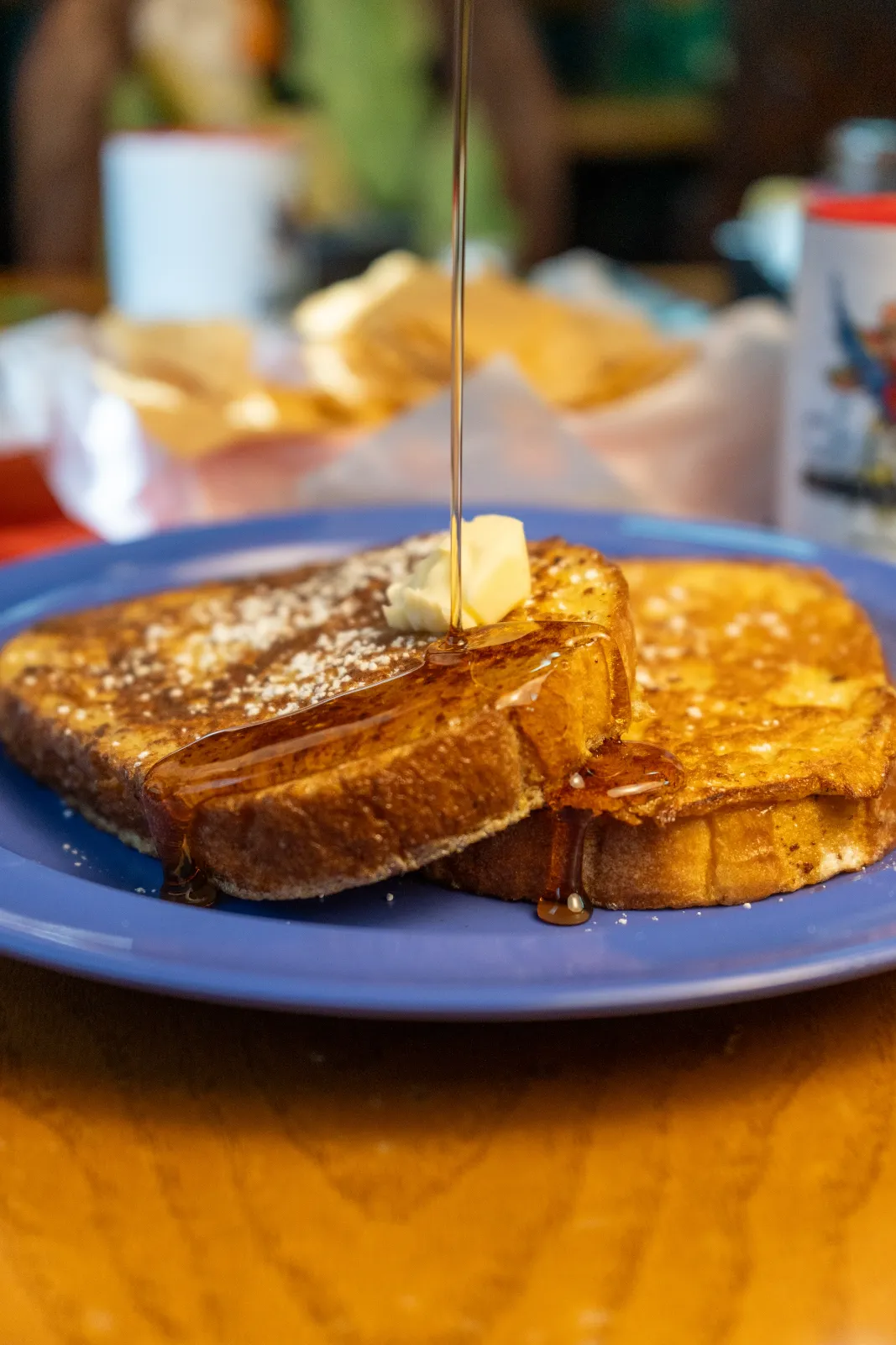 Syrup pouring over french toast